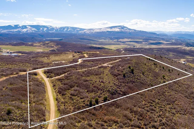 a kitchen with stainless steel appliances granite countertop a sink and a stove