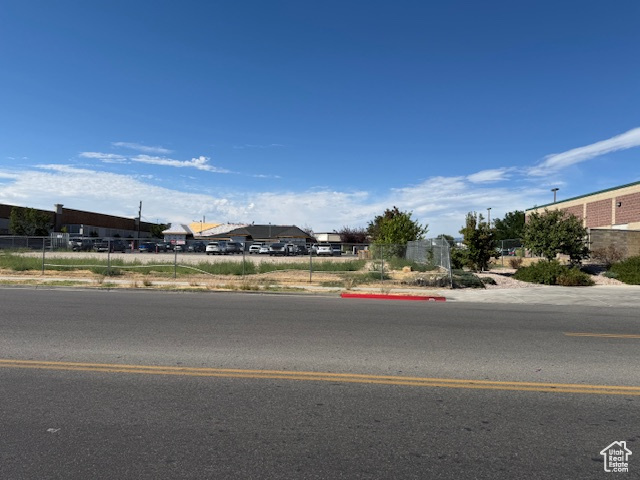 526 King Street, Unit 2 Layton, UT 84041 - Photo 8 of 9 North view road featuring sidewalks and curbs