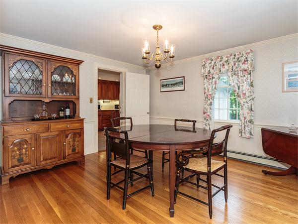 4 Robinhood Road Winchester, MA 01890 - Photo 2 of 26 a view of a dining room with furniture window and wooden floor