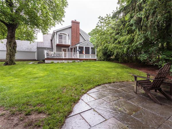 4 Robinhood Road Winchester, MA 01890 - Photo 23 of 26 a view of a house with backyard and sitting area