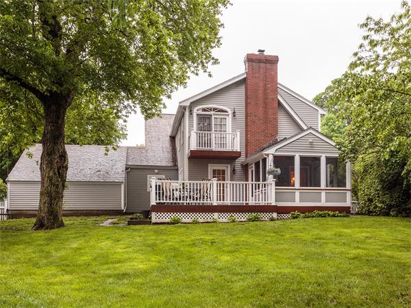 4 Robinhood Road Winchester, MA 01890 - Photo 25 of 26 a front view of a house with a yard