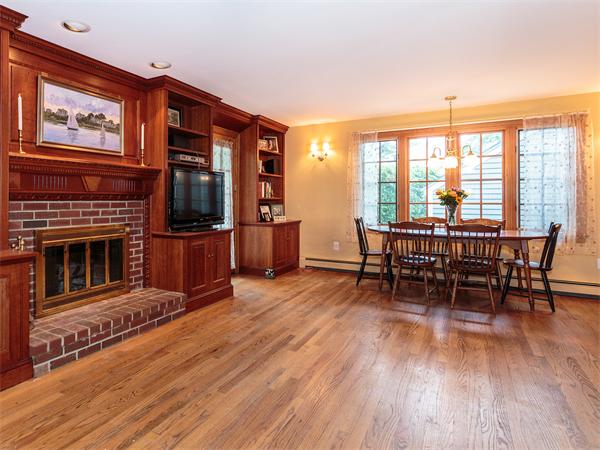 4 Robinhood Road Winchester, MA 01890 - Photo 7 of 26 a view of a livingroom with furniture window and wooden floor
