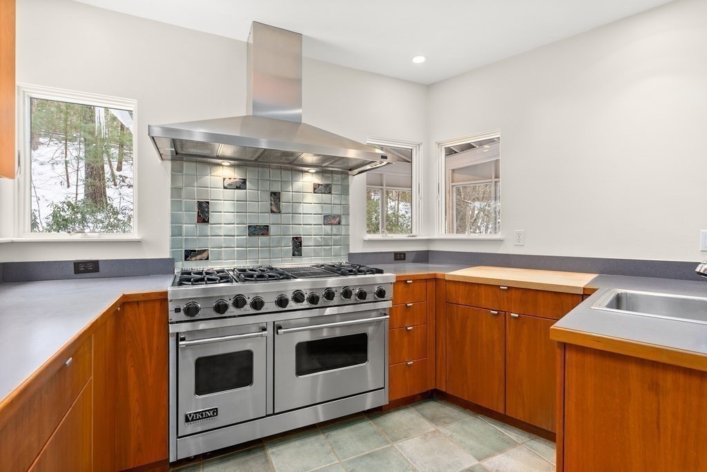 9 Valley View Road Weston, MA 02493 - Photo 11 of 30 a kitchen with a stove and a sink
