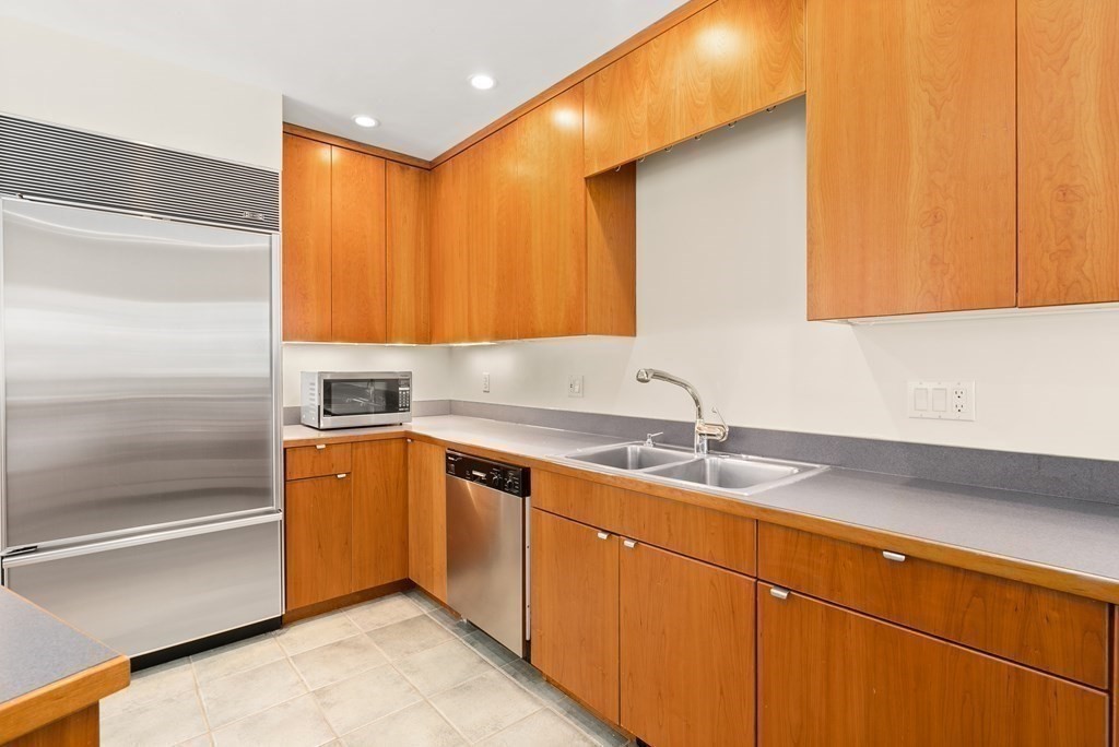 9 Valley View Road Weston, MA 02493 - Photo 12 of 30 a kitchen with stainless steel appliances granite countertop a sink and a cabinets