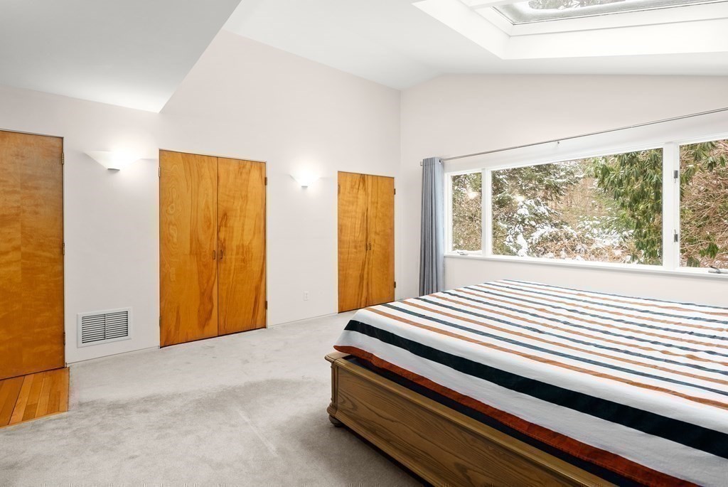 9 Valley View Road Weston, MA 02493 - Photo 14 of 30 a bedroom with a bed and wooden floor