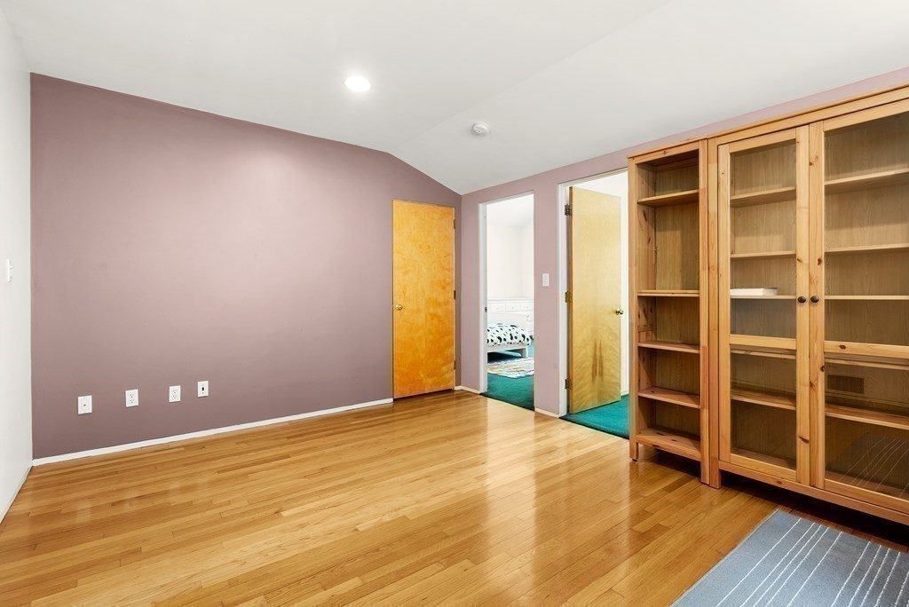 9 Valley View Road Weston, MA 02493 - Photo 20 of 30 a view of an empty room with wooden floor and closet
