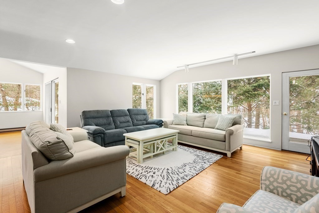 9 Valley View Road Weston, MA 02493 - Photo 2 of 30 a living room with furniture and a large window