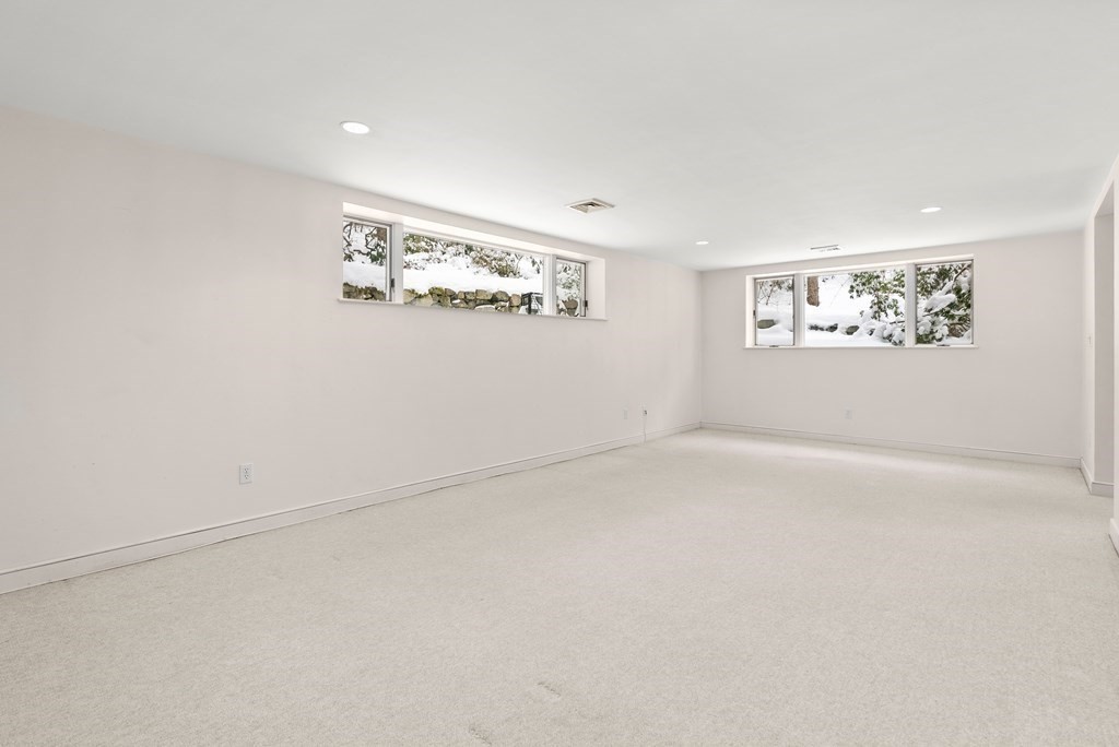 9 Valley View Road Weston, MA 02493 - Photo 22 of 30 an empty room with windows