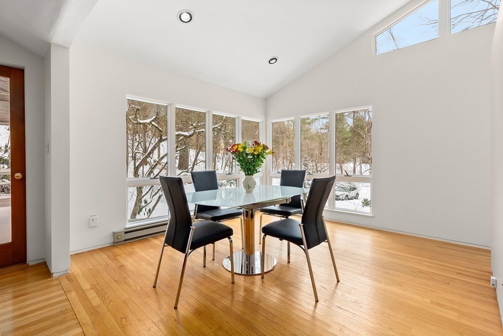 9 Valley View Road Weston, MA 02493 - Photo 8 of 30 a dining room with furniture and wooden floor