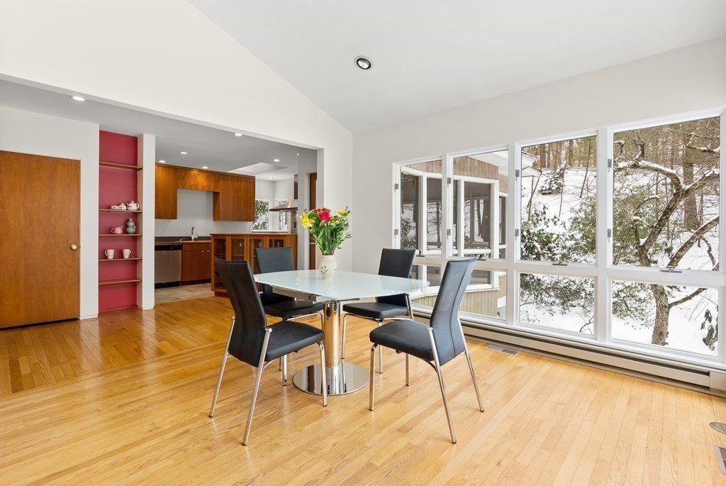 9 Valley View Road Weston, MA 02493 - Photo 9 of 30 a dining room with furniture and wooden floor