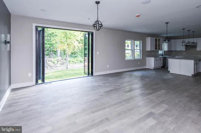 a bathroom with a toilet sink and a mirror