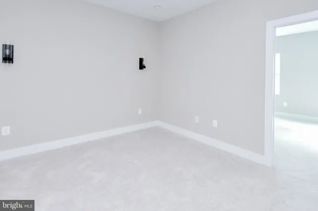 a white bath tub sitting in a bathroom