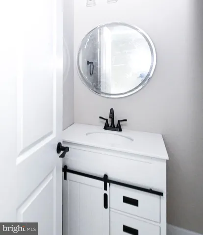a view of a kitchen with a sink