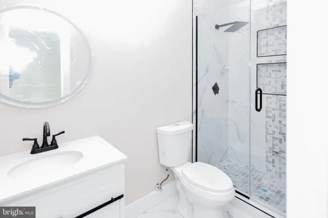 a view of a kitchen with a sink