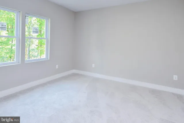 a kitchen with stainless steel appliances a refrigerator sink and stove