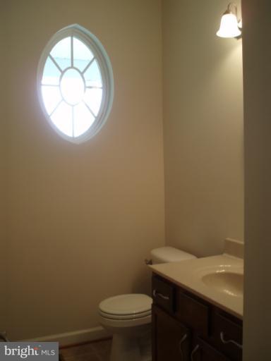 3 Elmer Derr Road Frederick, MD 21703 - Photo 14 of 30 a bathroom with a toilet and a sink