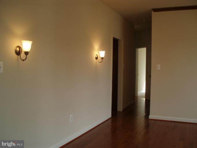 3 Elmer Derr Road Frederick, MD 21703 - Photo 3 of 30 a view of a livingroom with wooden floor