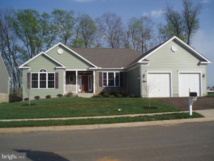 3 Elmer Derr Road Frederick, MD 21703 - Photo 28 of 30 a front view of a house with a garden