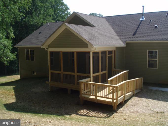 3 Elmer Derr Road Frederick, MD 21703 - Photo 30 of 30 a view of a roof deck with a chair