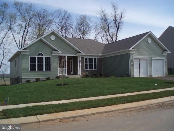 3 Elmer Derr Road Frederick, MD 21703 - Photo 5 of 30 a front view of a house with a yard