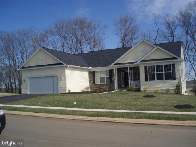 3 Elmer Derr Road Frederick, MD 21703 - Photo 8 of 30 a front view of a house with a yard