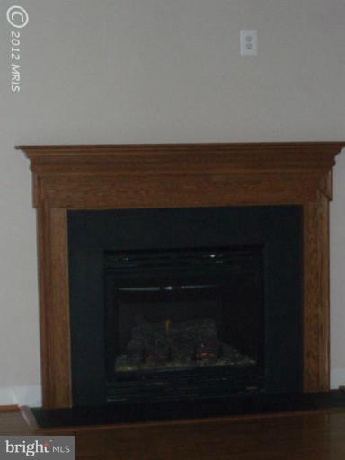 3 Elmer Derr Road Frederick, MD 21703 - Photo 10 of 30 a room with a bench