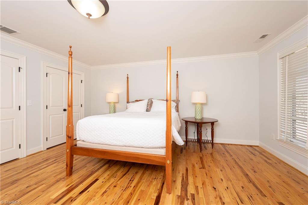 287 James Way Bermuda Run, NC 27006 - Photo 27 of 44 Bedroom 4, double closets, hickory flooring and adjoining bath on the upper level