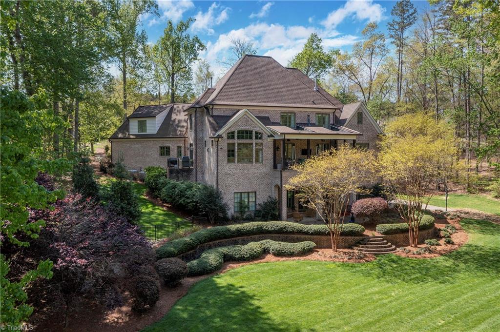 287 James Way Bermuda Run, NC 27006 - Photo 43 of 44 Tiered, mature landscaping in rear yard- perfect area for pool