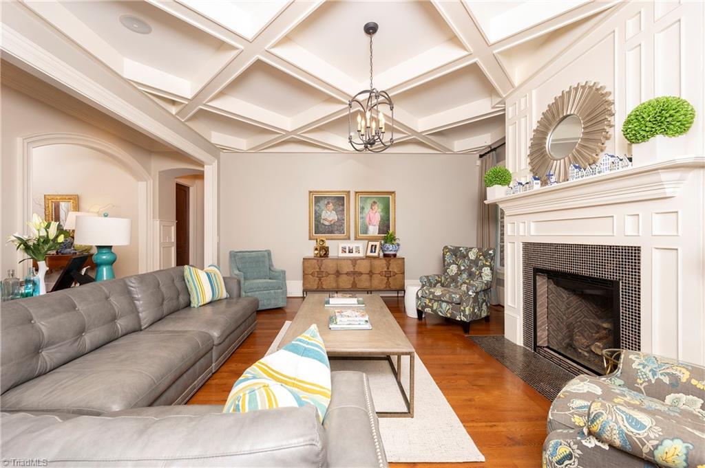287 James Way Bermuda Run, NC 27006 - Photo 7 of 44 Coffered ceiling, recessed accent lighting, fireplace in living room