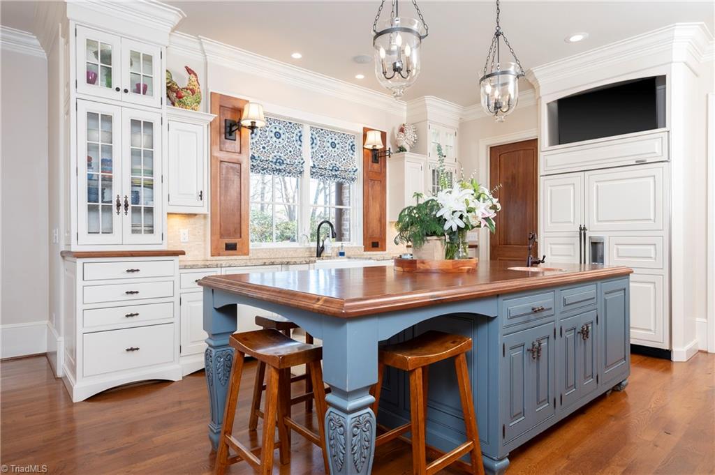 287 James Way Bermuda Run, NC 27006 - Photo 10 of 44 Furniture-like cupboards with seeded glass doors