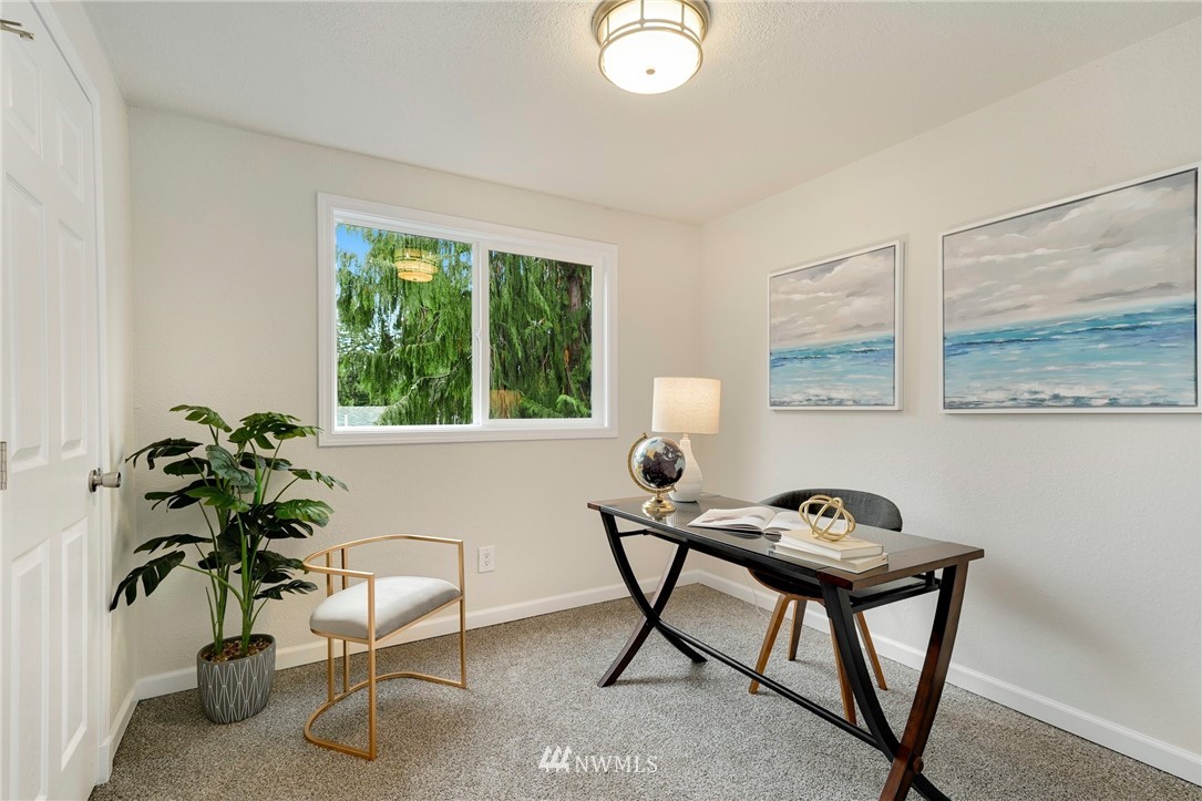 17307 18th Avenue Southeast Bothell, WA 98012 - Photo 12 of 40 a room with furniture and a potted plant
