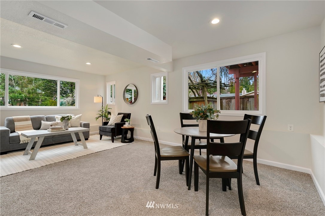 17307 18th Avenue Southeast Bothell, WA 98012 - Photo 19 of 40 a view of a dining room with furniture window and outside view