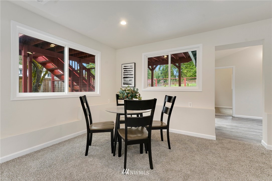 17307 18th Avenue Southeast Bothell, WA 98012 - Photo 20 of 40 a dining room with furniture and window