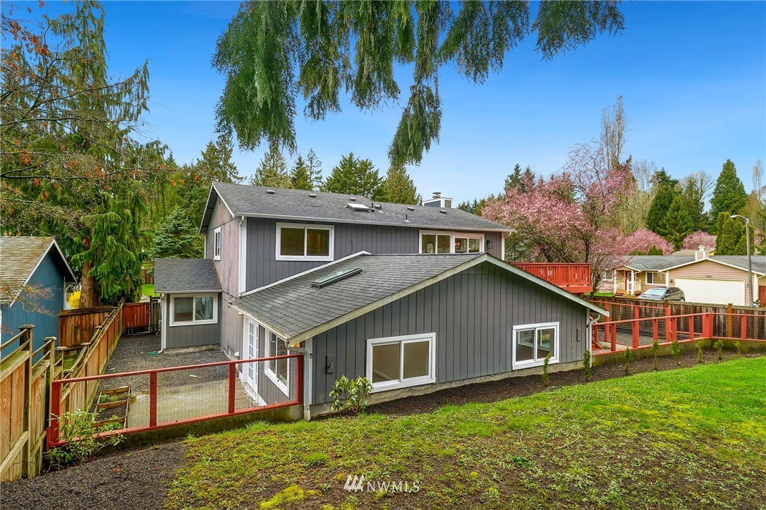 17307 18th Avenue Southeast Bothell, WA 98012 - Photo 31 of 40 a view of house with a yard