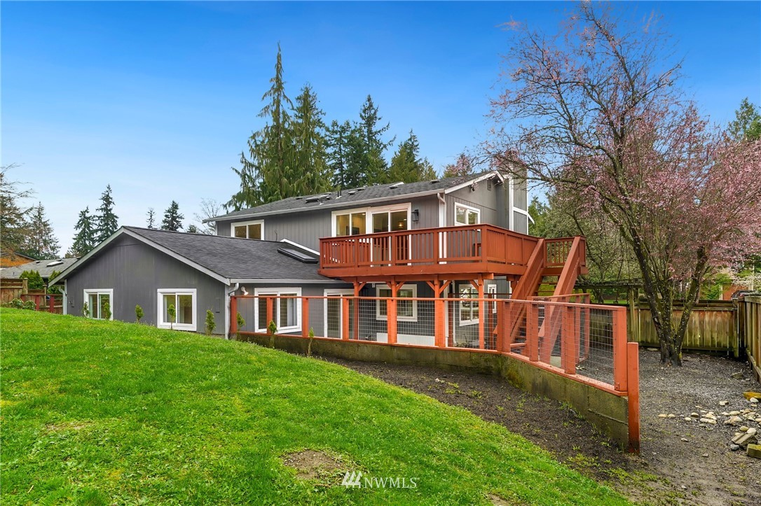 17307 18th Avenue Southeast Bothell, WA 98012 - Photo 32 of 40 a front view of a house with a garden