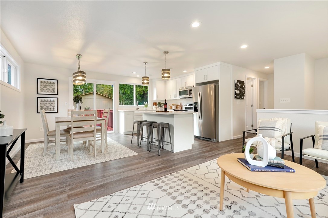 17307 18th Avenue Southeast Bothell, WA 98012 - Photo 5 of 40 a living room with furniture and a table