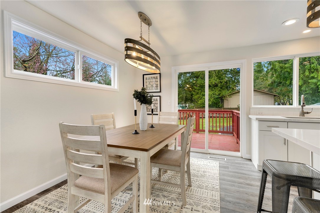 17307 18th Avenue Southeast Bothell, WA 98012 - Photo 6 of 40 a view of a dining room with furniture window and outside view