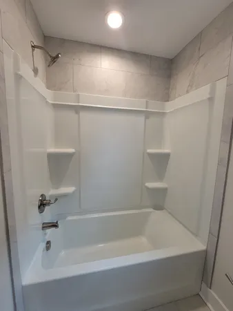 a bathroom with a bathtub