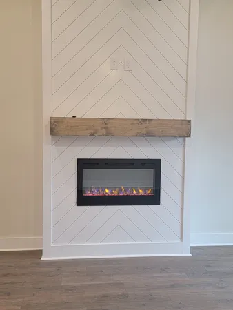 a white building with a fireplace