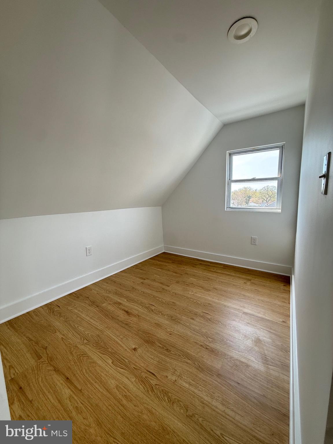 2125 Oakland Road Middle River, MD 21220 - Photo 9 of 15 an empty room with a window