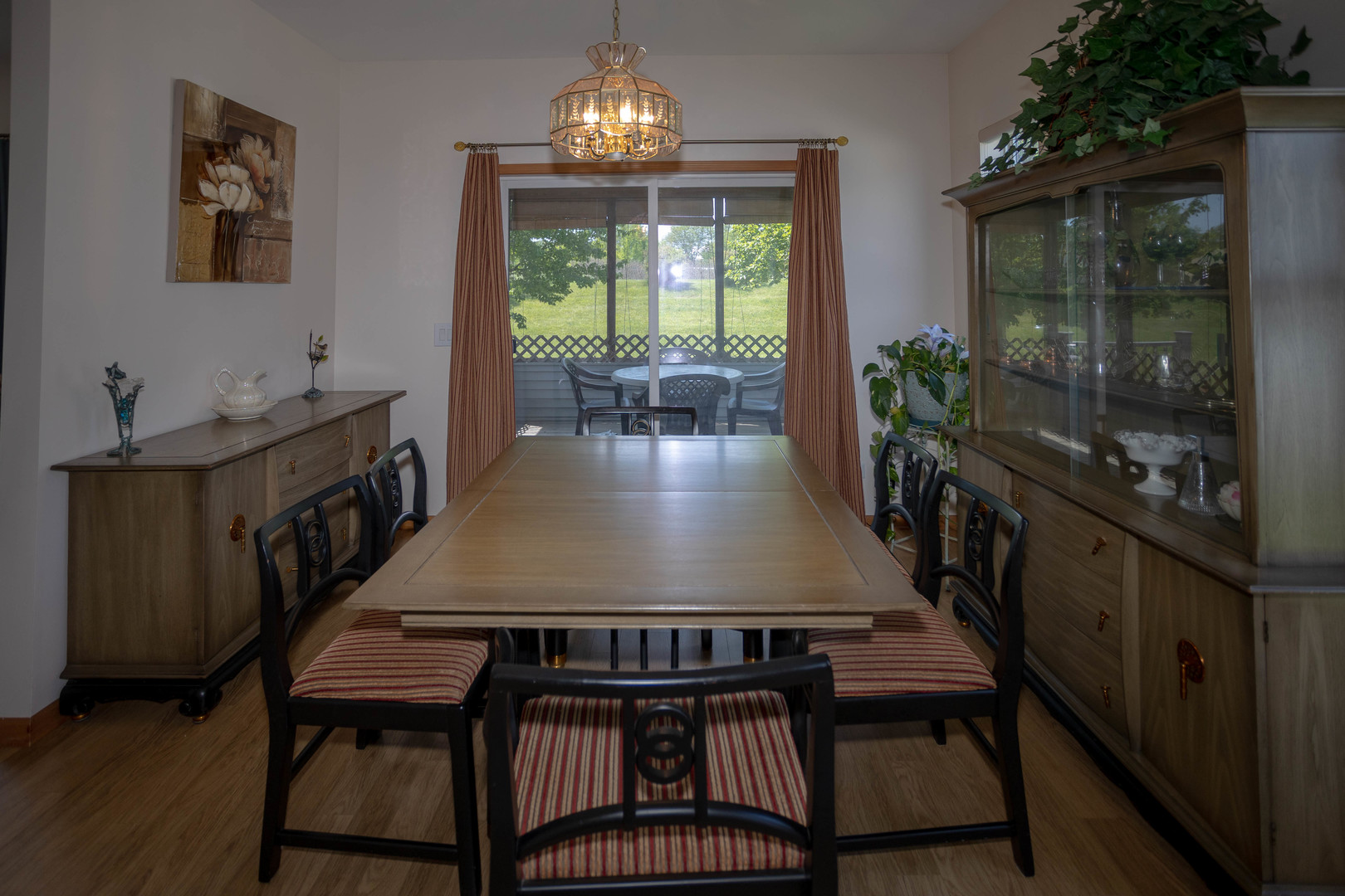 212 Rodeo Drive, Unit 2179 Grayslake, IL 60030 - Photo 16 of 31 a view of a dining room with furniture window and wooden floor