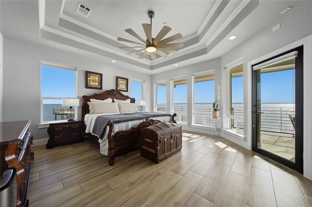 1617 Maple Drive Tool, TX 75143 - Photo 13 of 40 a bedroom with a bed and a large window