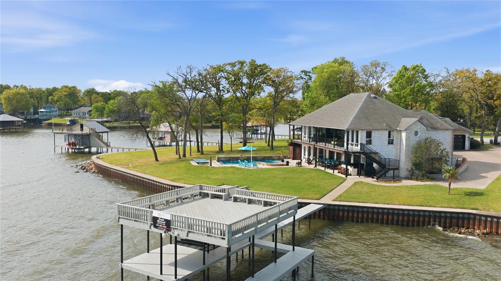 1617 Maple Drive Tool, TX 75143 - Photo 2 of 40 a view of house with swimming pool yard and outdoor seating