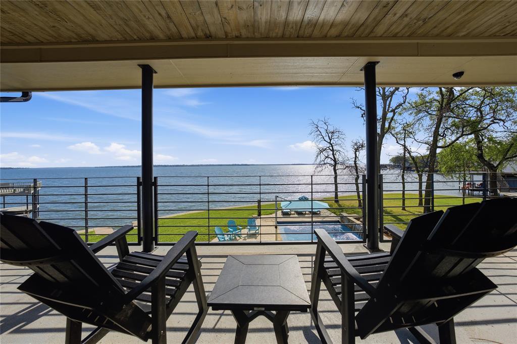 1617 Maple Drive Tool, TX 75143 - Photo 28 of 40 a view of a balcony with chairs and a table
