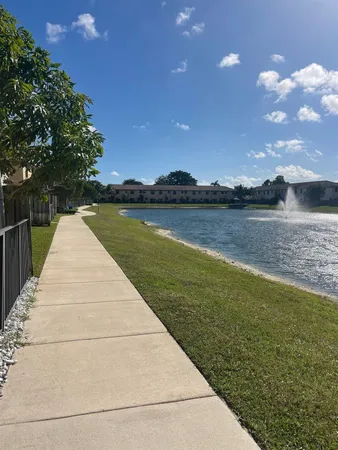 a front view of a house with yard
