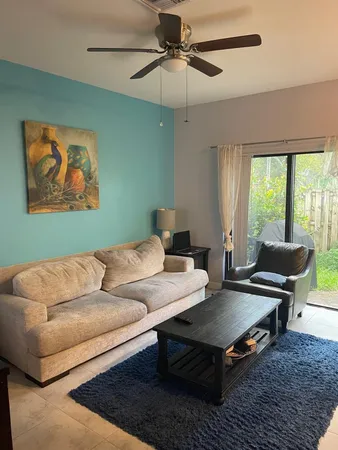 a kitchen with stainless steel appliances granite countertop a sink counter space and cabinets