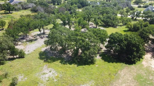a view of a back yard of a house