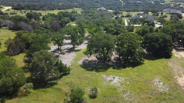 a view of residential houses with swimming pool