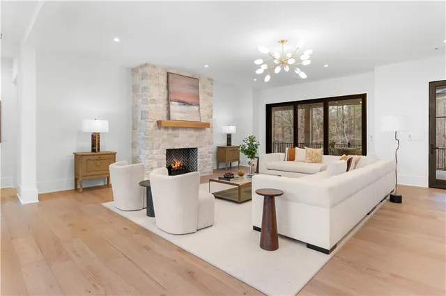 a large kitchen with a table and chairs in it