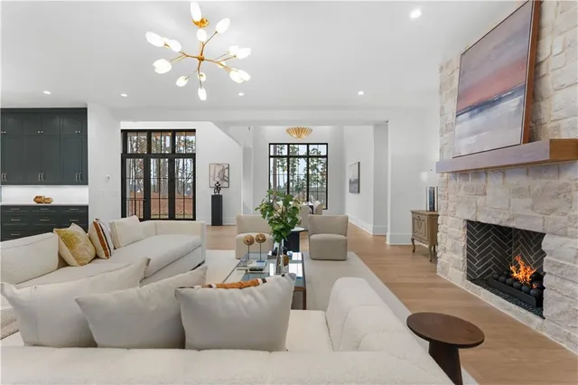 a kitchen with stainless steel appliances granite countertop a stove a sink and a granite counter tops